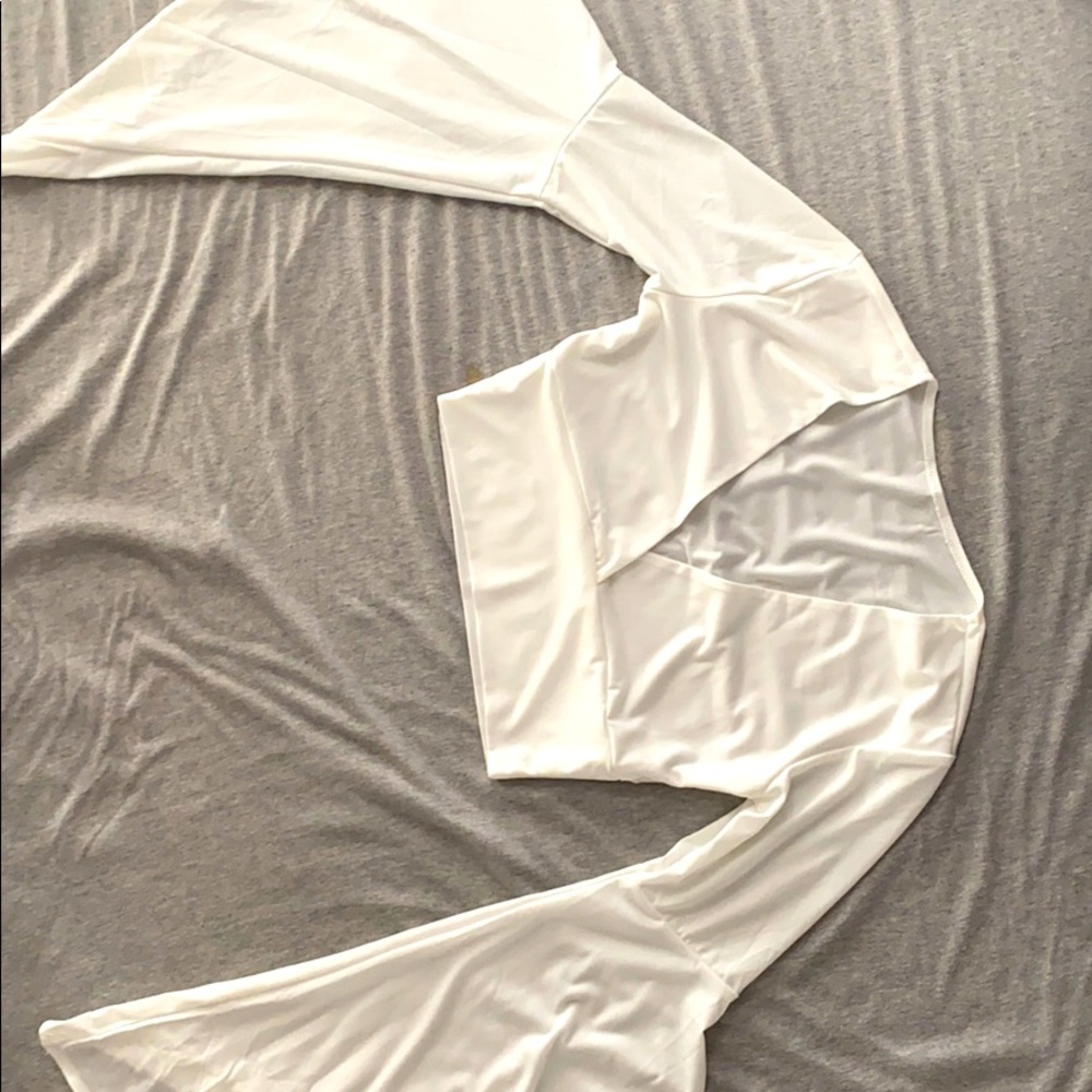 A white polyester crop top